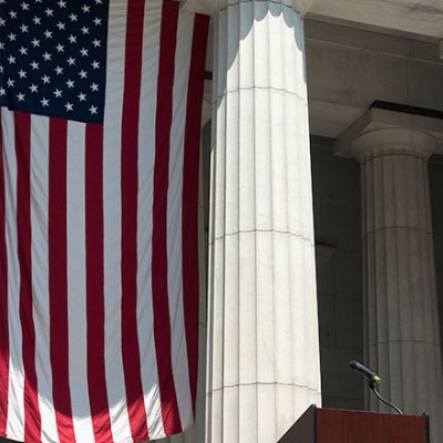 American flag next to a building